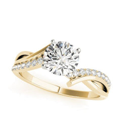 Crisscross diamond engagement ring in yellow gold