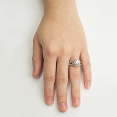 Designer Platinum Diamond Engagement Ring with Braided Diamond Halo